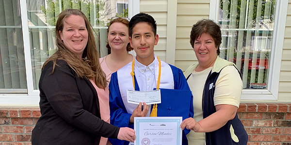 Gerson, with MHNW property staff — Erin, Nicole and Isabel