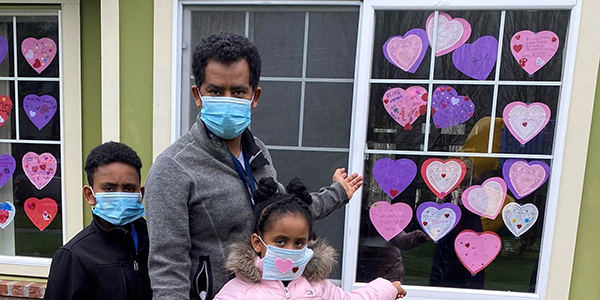 Residents with heart art displays at Lincoln Way