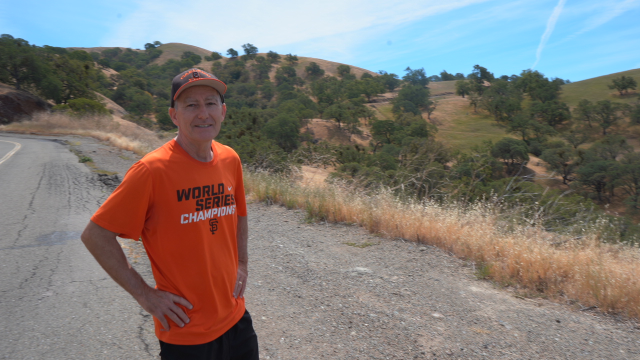 Bob walking on a nature trail