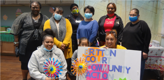 Unity Circles Group Photo - 9 Women wearing masks smiling at the camera